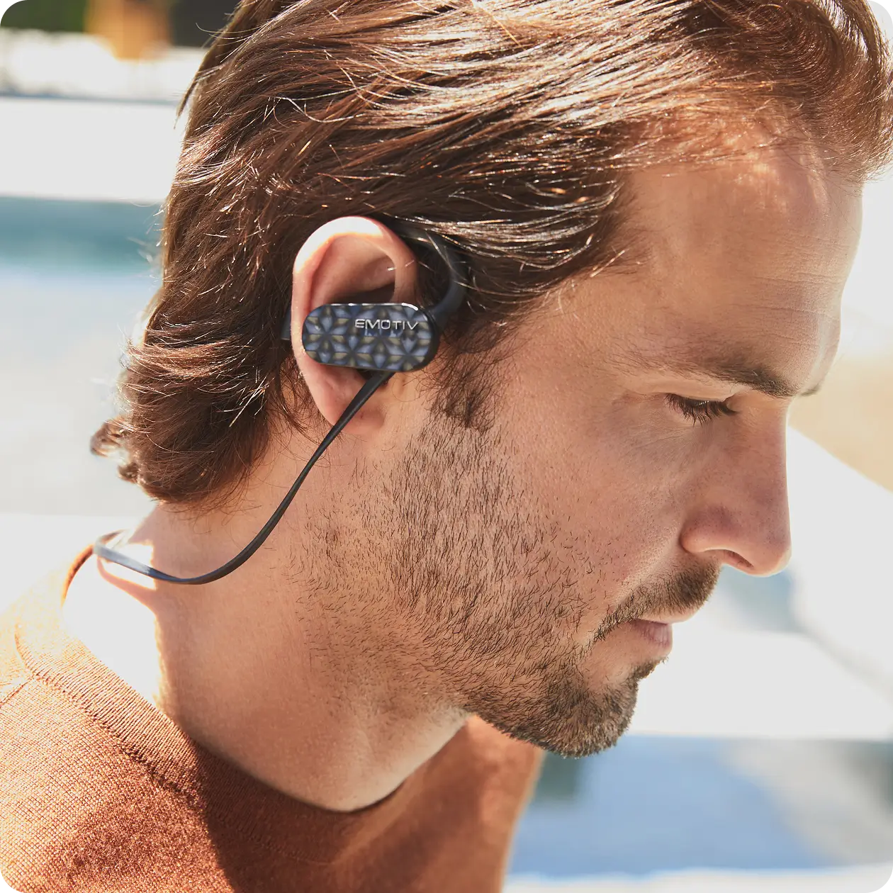 Man wearing an Emotiv MN8